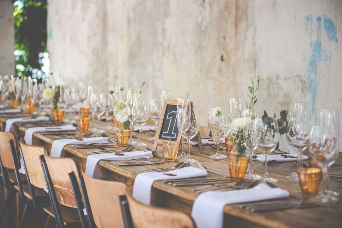 Elegant table setting with rustic florals and candles